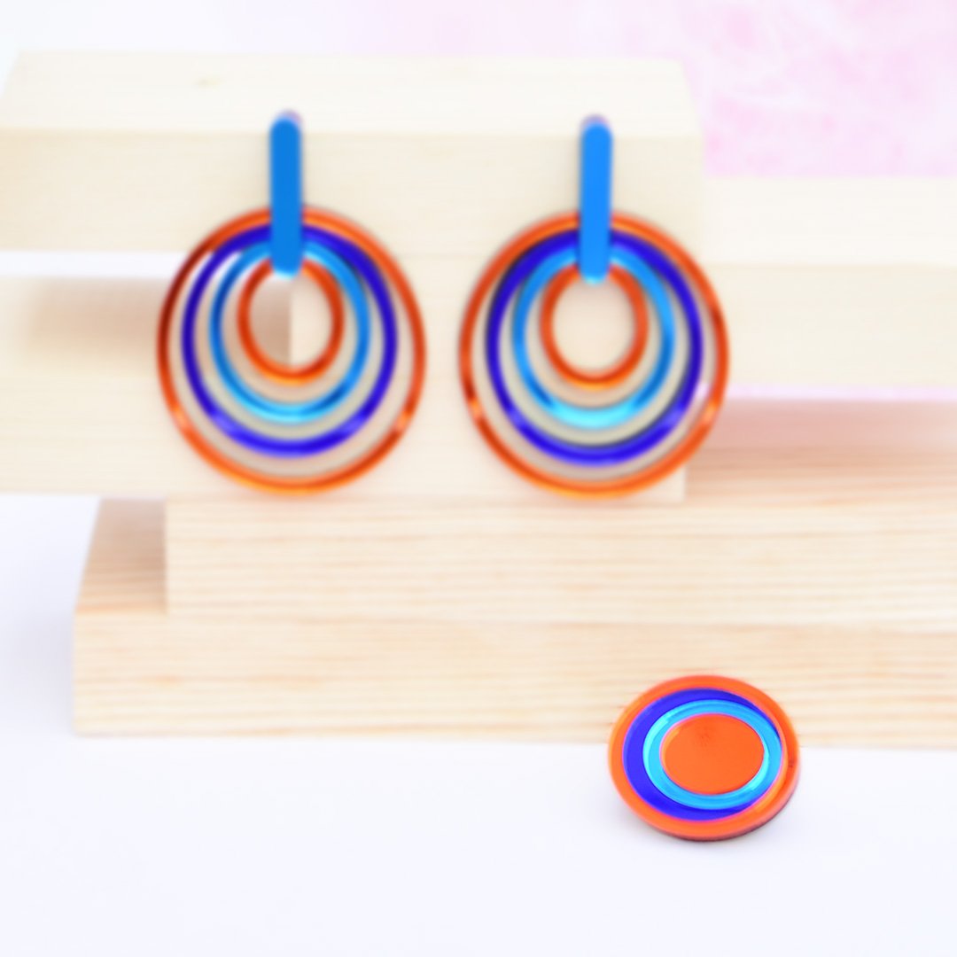 Conjunto Elipse Multicolor naranja con anillo y pendientes